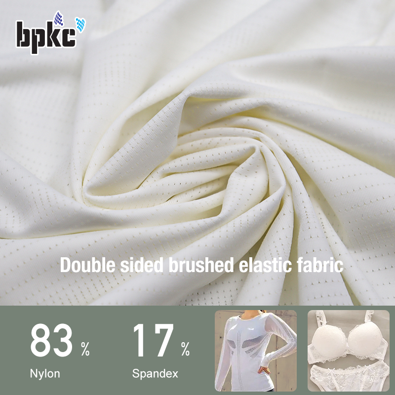 knitted stretch nylon spandex breathable jacquard hole wicking fabric